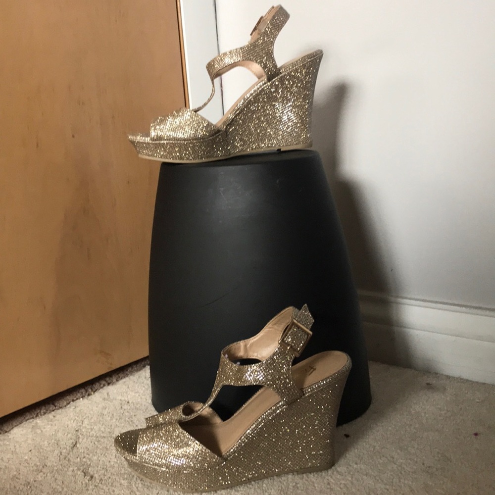 Gold wedged heels